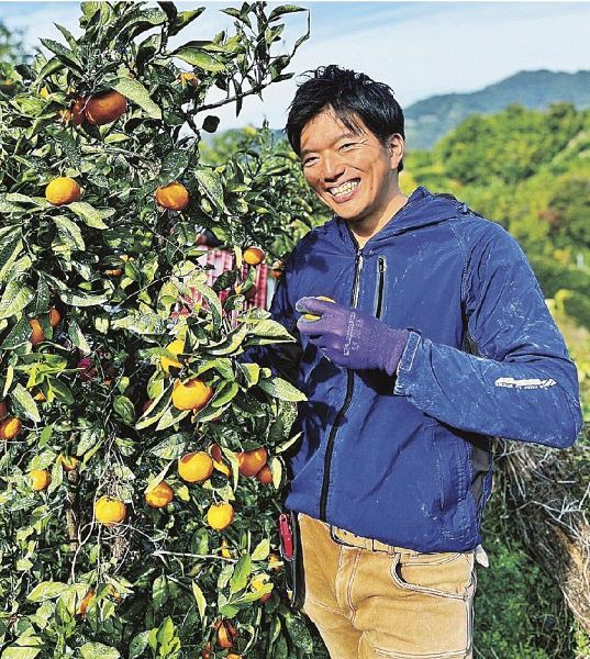 ミカン栽培の研修を終えた後、新規就農を目指す大前拓也さん（和歌山県田辺市上秋津で）